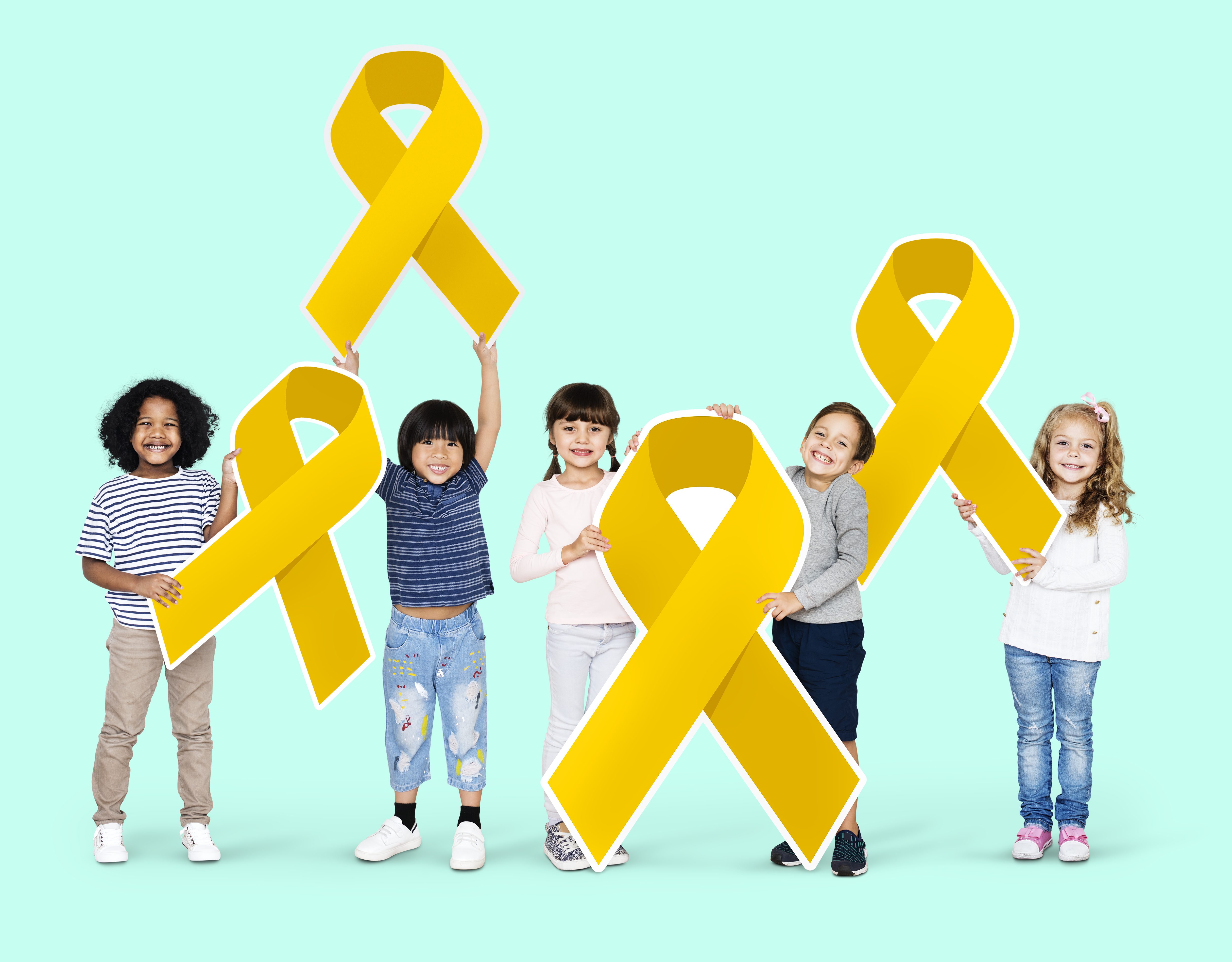 Kids holding gold ribbons supporting childhood cancer awareness